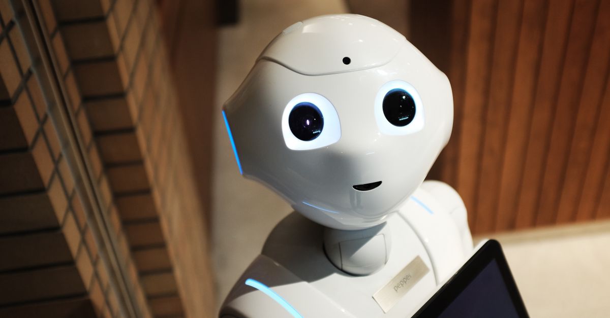 A white humanoid robot, representing artificial intelligence and AI engineering
